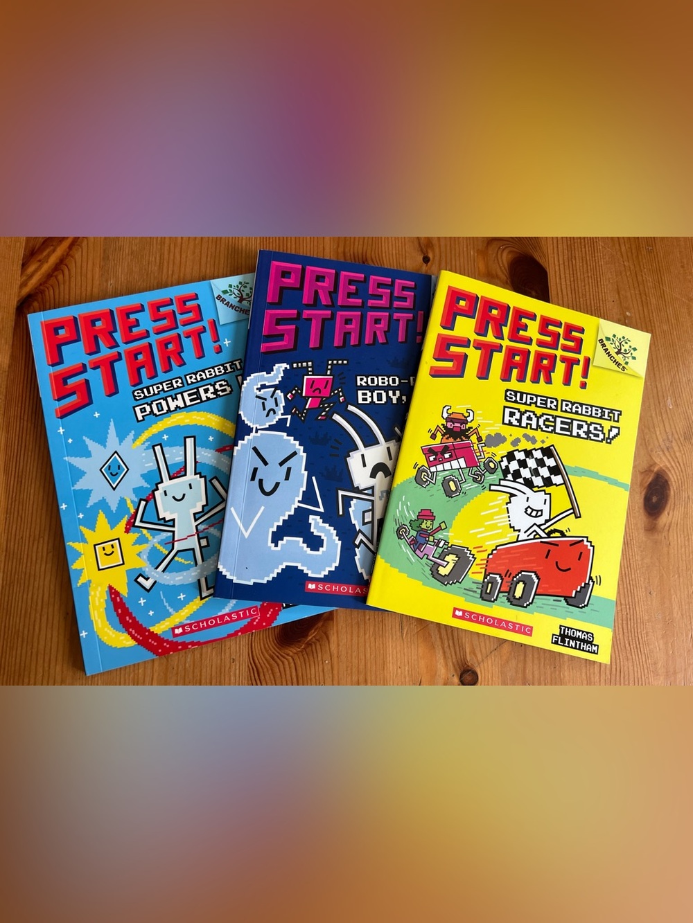 Scholastic 'Press Start!' Bright Blue & Magenta Pixel-Art Book